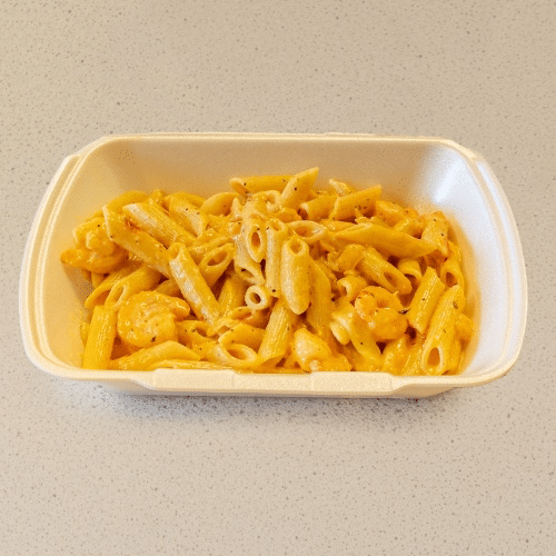 Pasta scampi Cajun in roomsaus